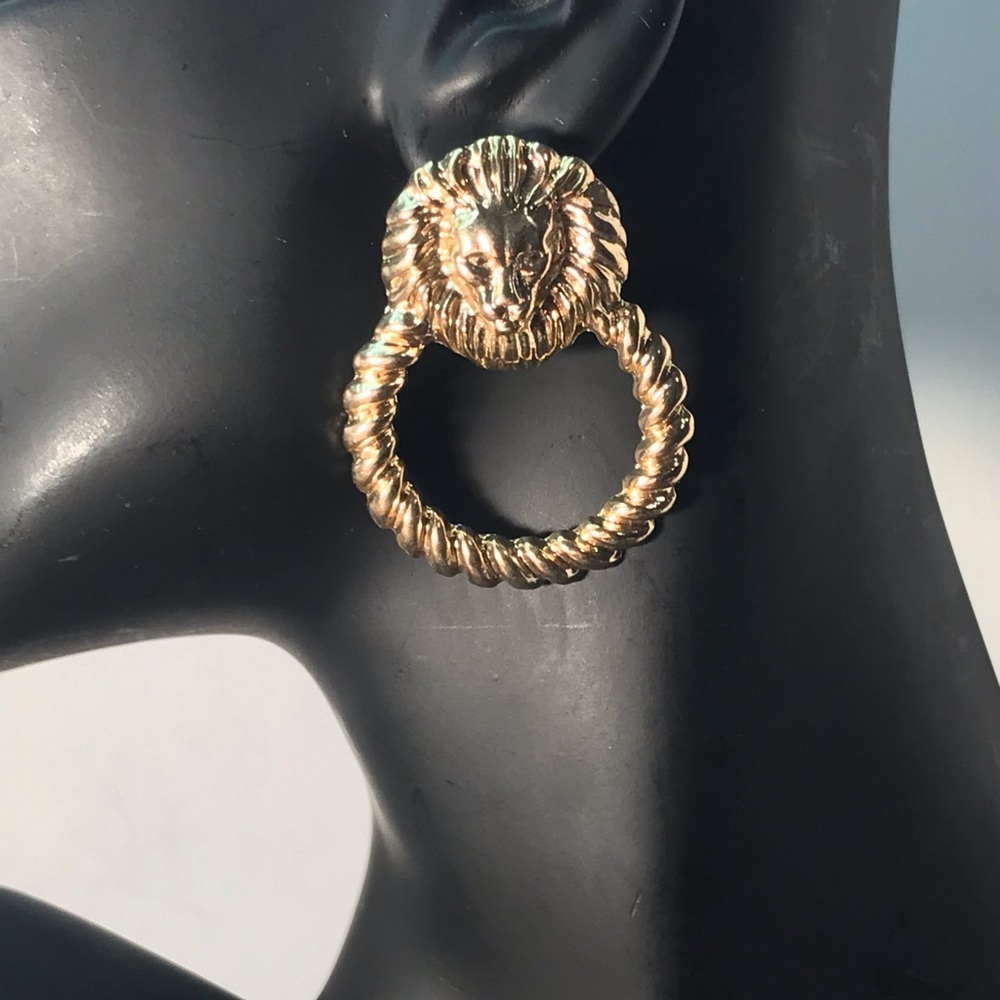 Gold tone lion earrings with braided hoop